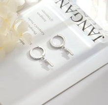 Load image into Gallery viewer, Sterling silver and crystal Huggie earrings with lightning charm