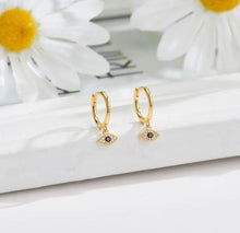 Load image into Gallery viewer, Gold plated sterling silver Huggies with evil eye charm