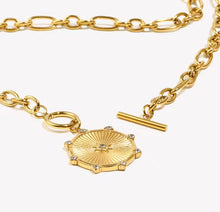 Load image into Gallery viewer, Celestial inspired gold sunburst necklace, 18k gold plated medallion on durable stainless steel chain
