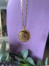 Load image into Gallery viewer, Celestial Zodiac Medallion Necklace – Leo
Gold Plated Stainless Steel | Waterproof, Adjustable, Hypoallergenic