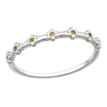Load image into Gallery viewer, Silver ring with small yellow gemstones on a white background