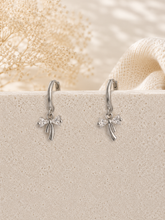 Load image into Gallery viewer, Crystal Bow Charm Huggie Earrings – Silver or Gold
