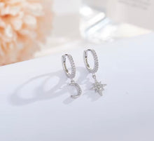 Load image into Gallery viewer, sterling silver crystal mismatched moon and star huggie earrings
