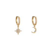 Load image into Gallery viewer, Gold plated sterling silver crystal mismatched moon and star huggie earrings
