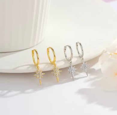 Huggie earrings gold-plated sterling silver with a North Star crystal charm