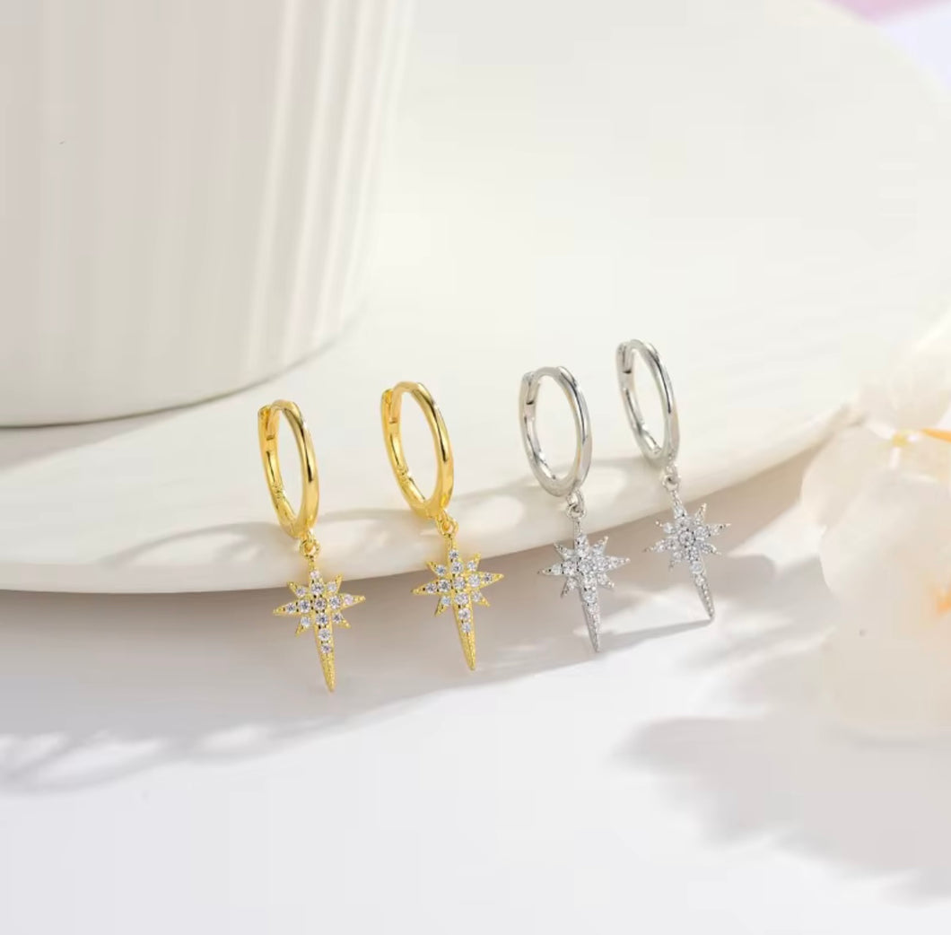 Huggie earrings gold-plated sterling silver with a North Star crystal charm
