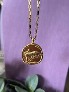 Celestial Zodiac Medallion Necklace – Taurus

Gold Plated Stainless Steel | Waterproof, Adjustable, Hypoallergenic