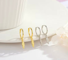 Load image into Gallery viewer, Feather charm Huggie earrings in sterling silver and gold plated
