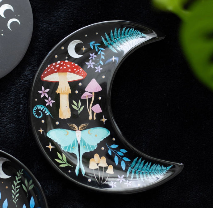 Close-up of mystical woodland design on trinket dish