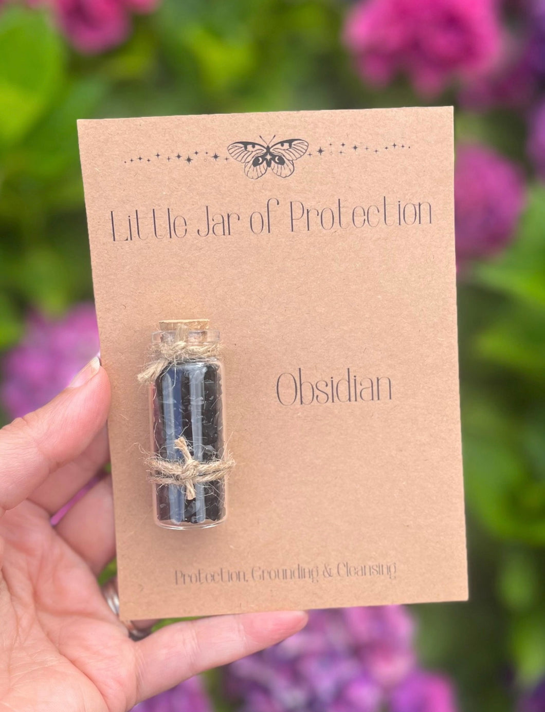 Little jar of crystals for protection obsidian