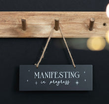 Load image into Gallery viewer, ‘Manifesting In Progress’ hanging sign
